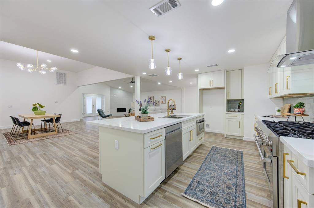 With an open flow into the living and breakfast rooms, this kitchen is designed for both functionality and style, making it perfect for cooking, entertaining, or simply enjoying everyday family life.