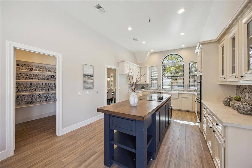 As you can see, you also have a massive pantry with an abundance of shelving.
