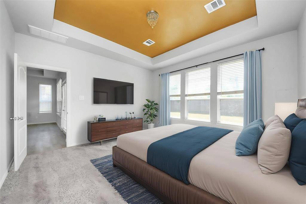 Charming single-story brick home with a two-car garage and a well-maintained front yard. Features a welcoming arched entryway and a clean, modern design. Perfect for comfortable family living.