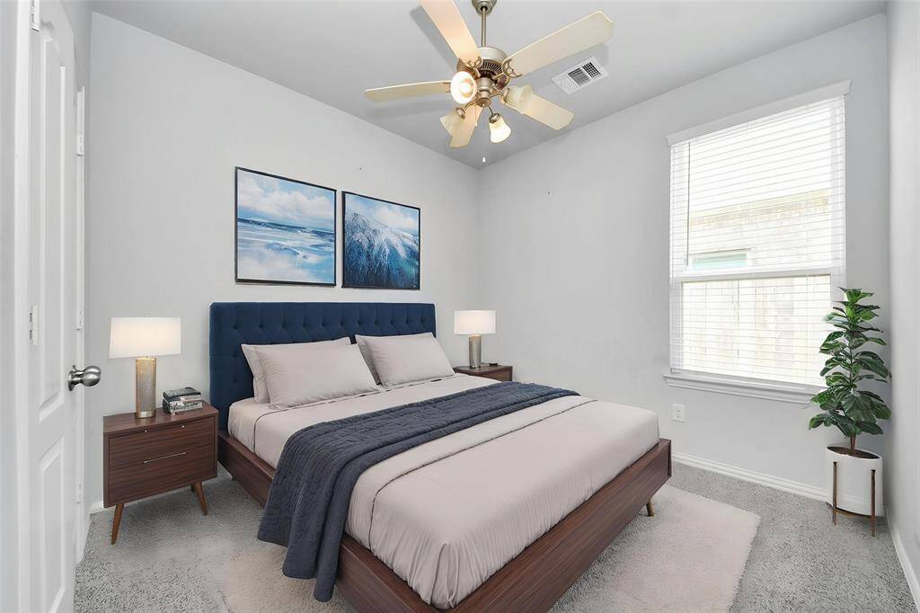 Charming single-story brick home with a two-car garage and a well-maintained front yard. Features a welcoming arched entryway and a clean, modern design. Perfect for comfortable family living.