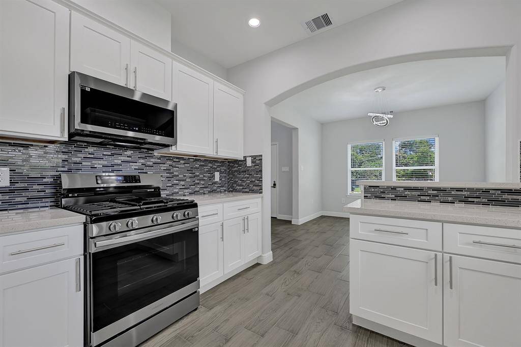 Sleek finishes and plenty of counter space for meal prep.