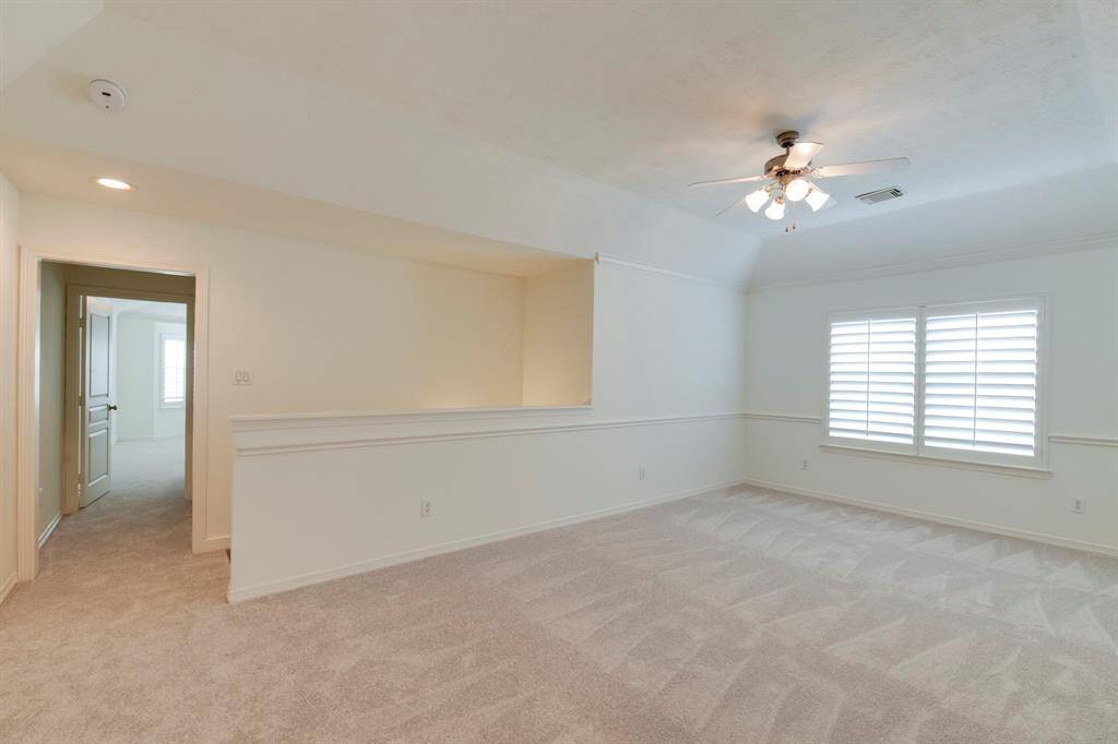 Primary bedroom suite to the right as you come up the stairs.