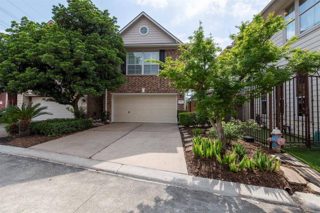 Home has newly landscaped front with large driveway with extra parking.