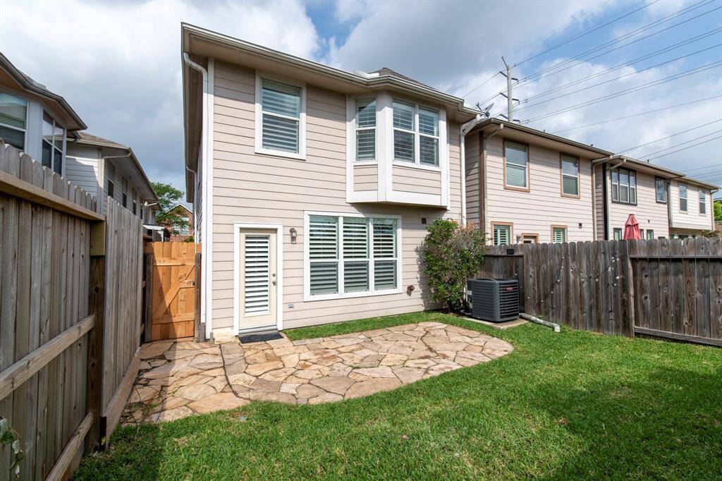 View of house from backyard. Backyard is spacious and perfect for relaxing.