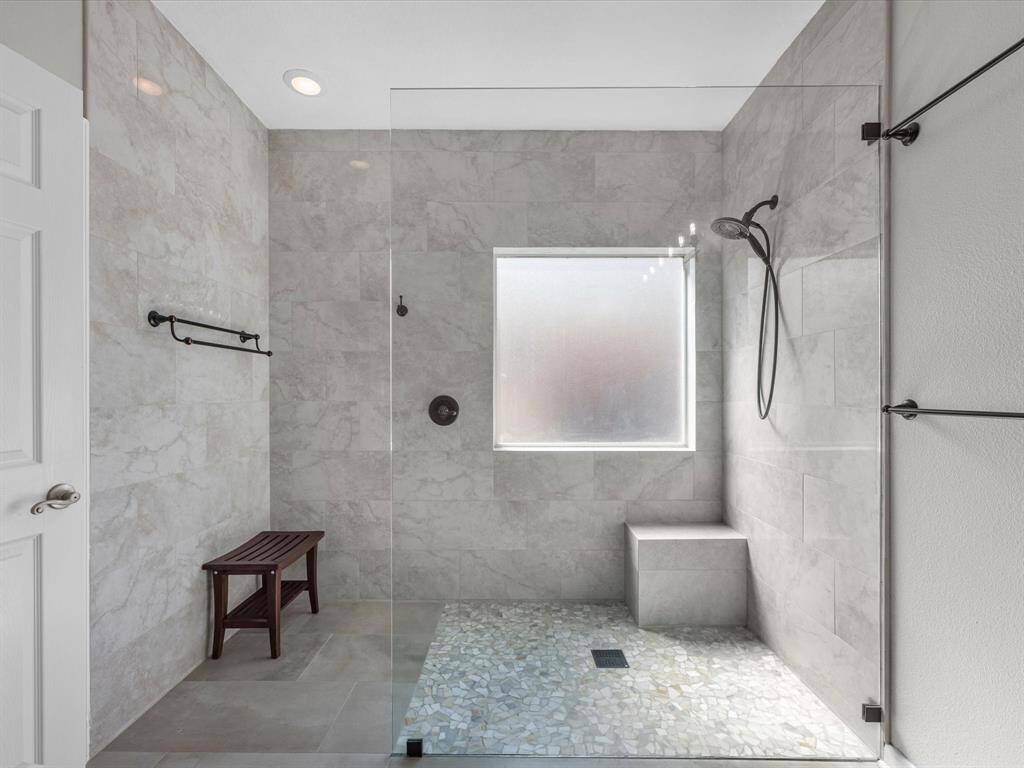 A close up view of the walk in shower.