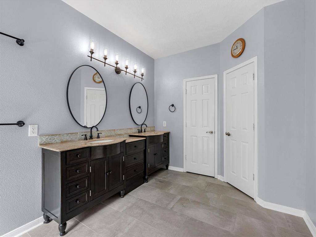 The ensuite bath has a linen closet and a water closet for privacy. The other walk in closet is behind the shower and offers plenty of space.
