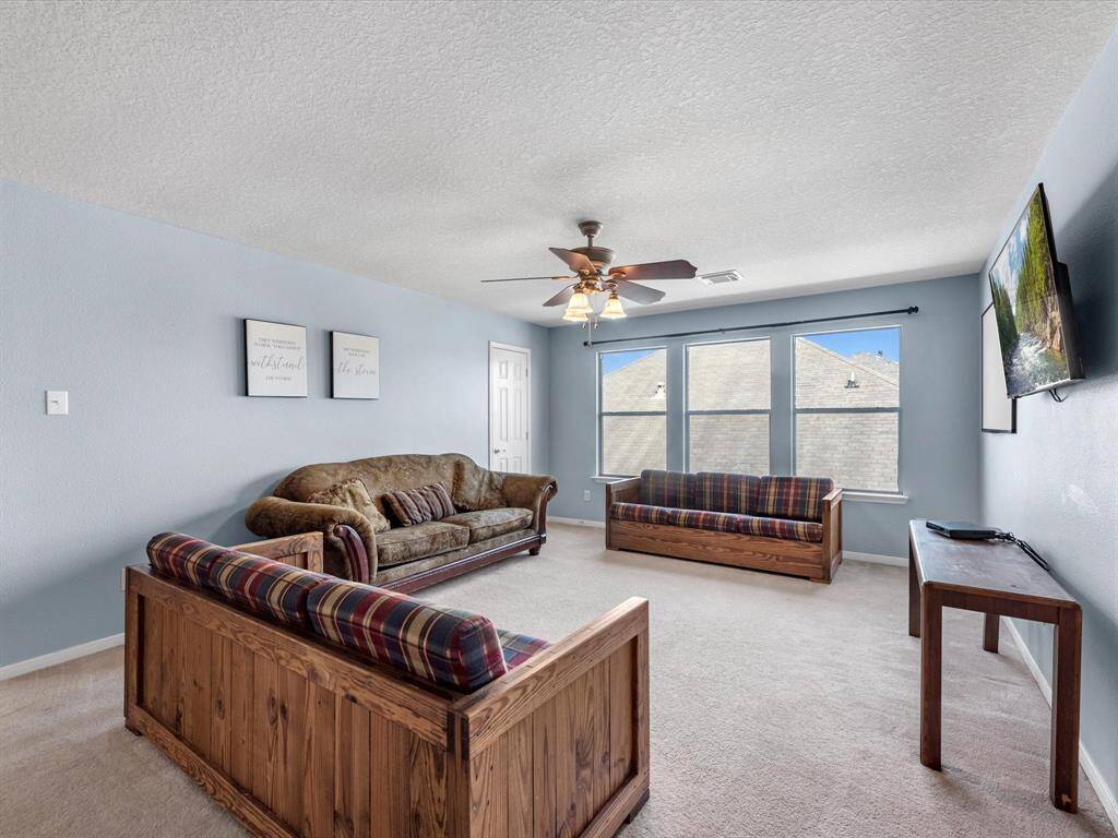 The large gameroom offers a storage closet. There's plenty of room to spread out for movie night or games.