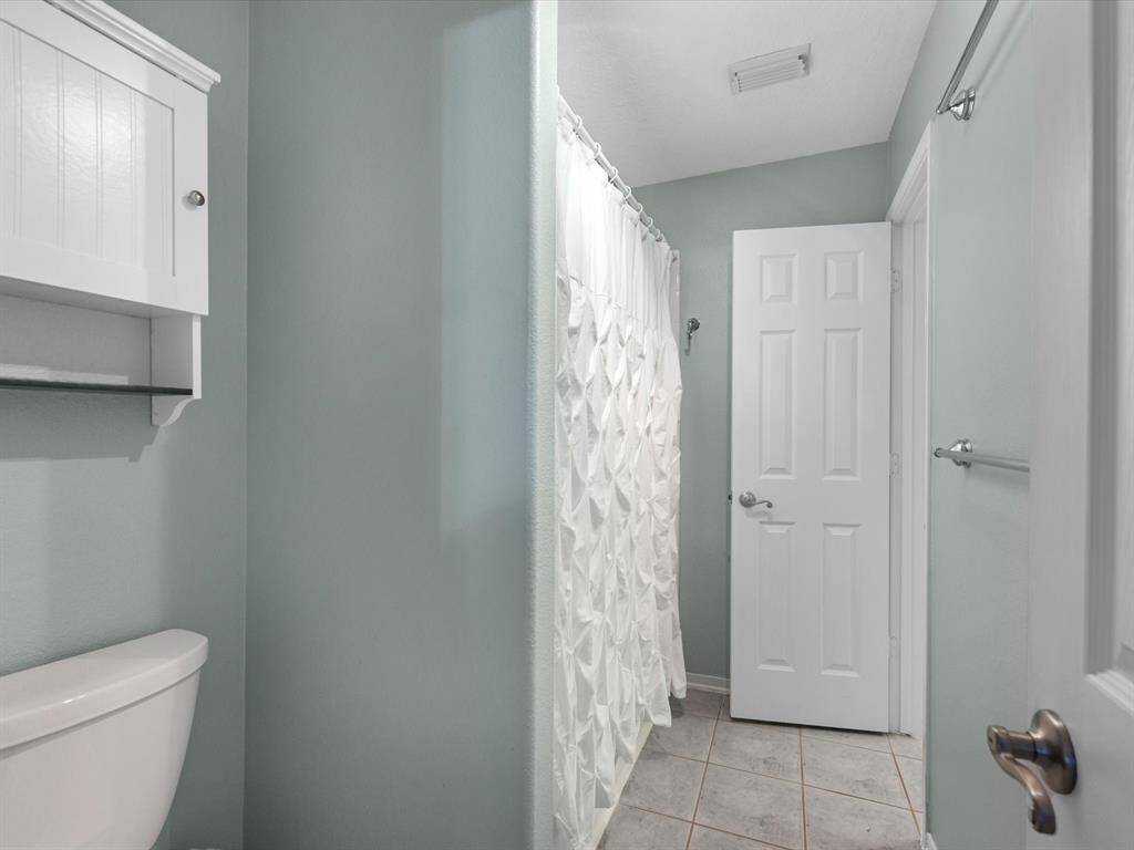 This bathroom is split between 2 upstairs bedrooms.