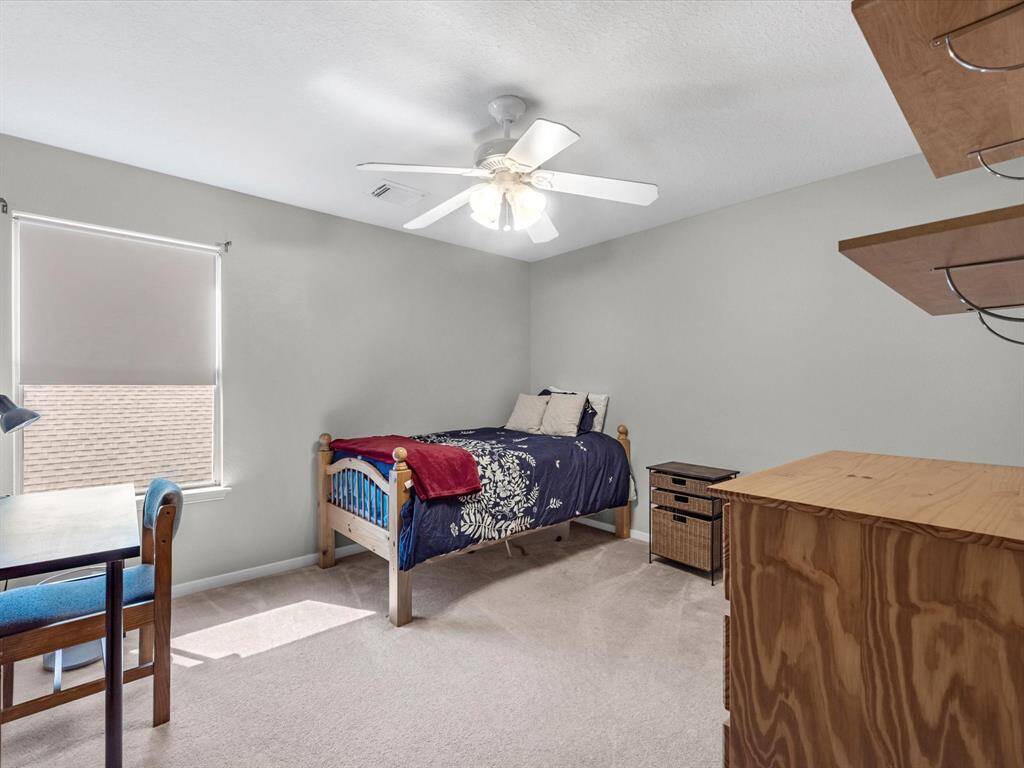 Another secondary bedroom upstairs.