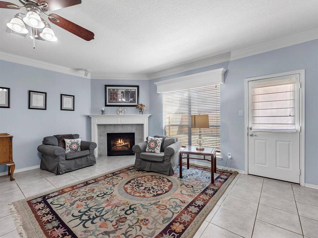 This room is bright with natural lighting and the tile flooring is easy to keep.