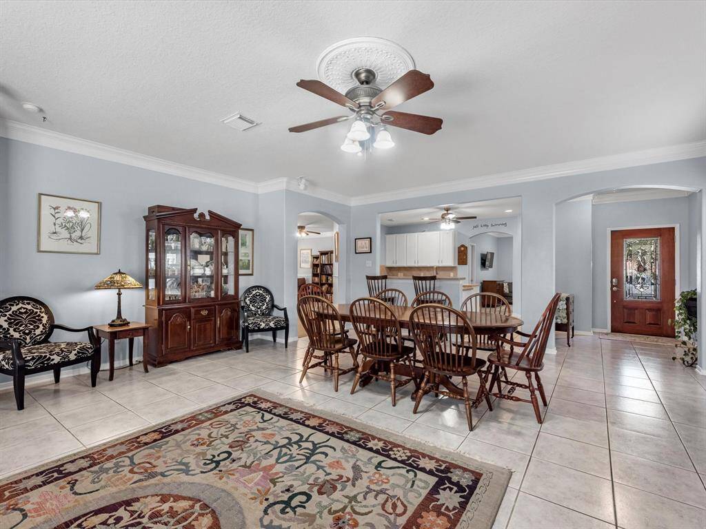 The owner has a large dining table that fits in between the family room and kitchen. But you can use the entire area for seating if you prefer. There's a dining area just through the door way at the back of the picture.