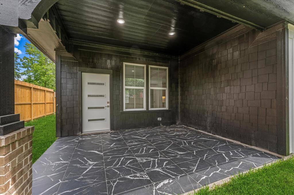This 10'x15' back porch gives you plenty of options to relax.