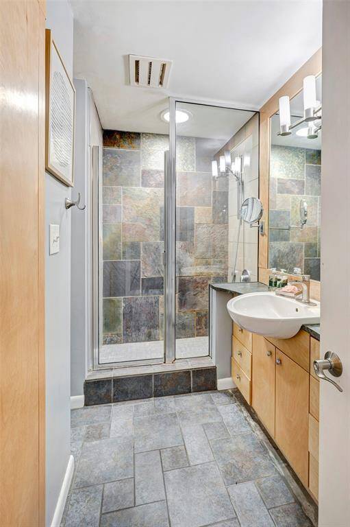 Secondary bath with shower.