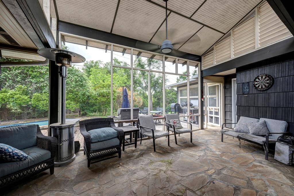 View from back porch to patio and pool.