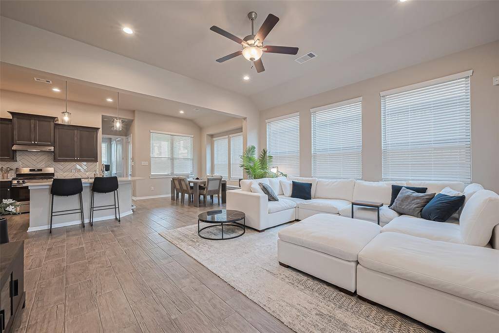 Living room that opens to kitchen and dinning