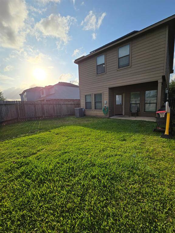 The fully fenced backyard is visable from the living area and the kitchen, let the kids play while you get a few things done.