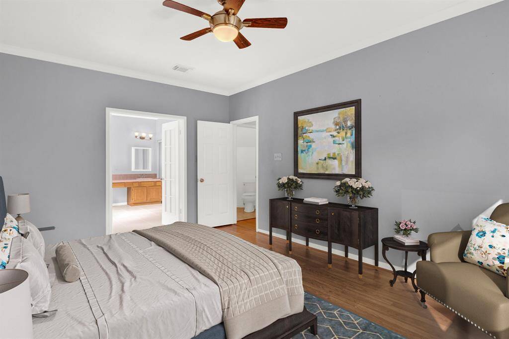 Primary bedroom. Image is virtually staged.