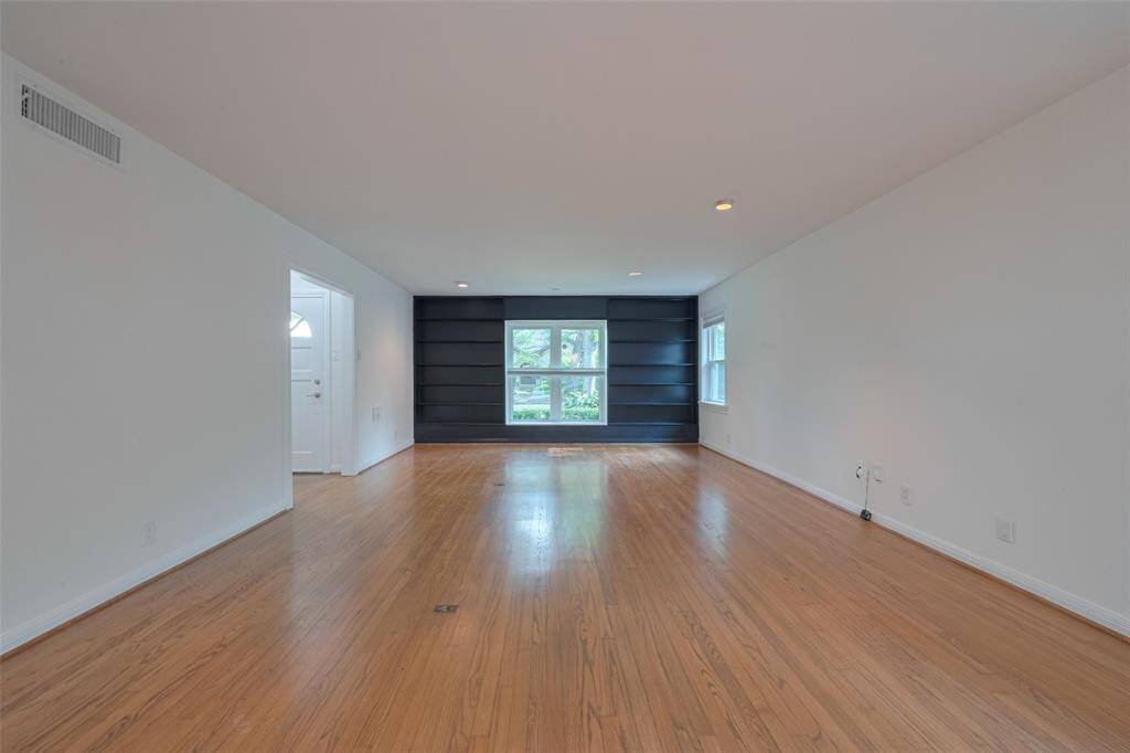 Another view of living and dining room.. Bright and open, perfect for entertaining.