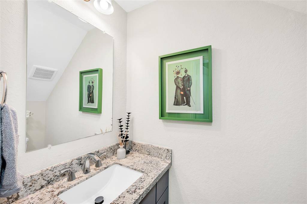 Convenient half bath located on the first floor—perfect for guests.
