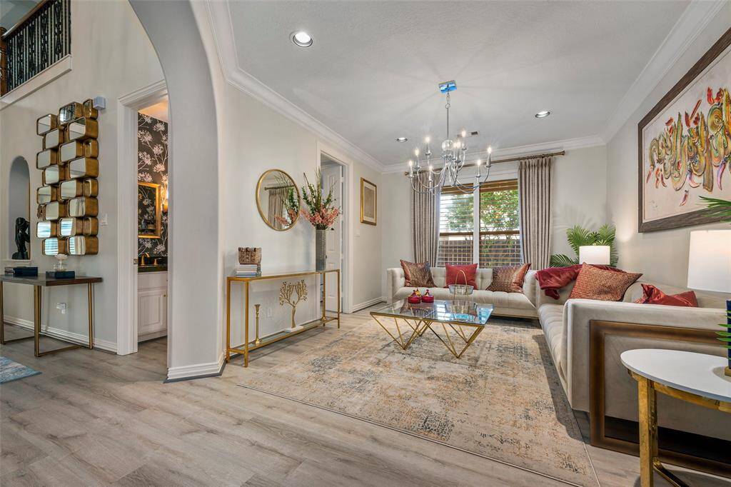 Updated flooring and shutters and curtains throughout the home