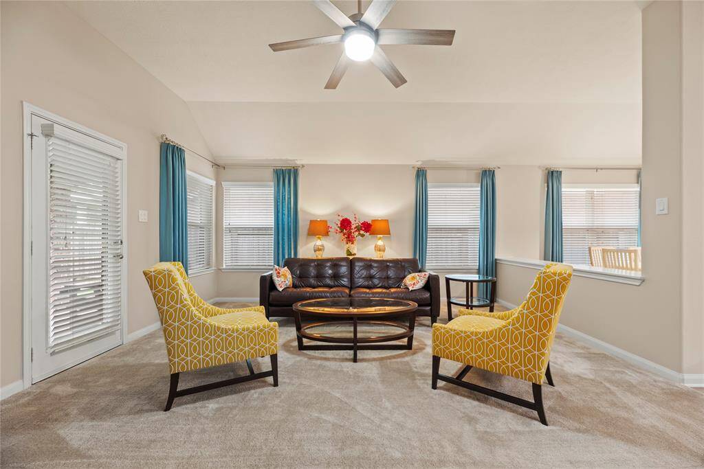 Family room has access to the back patio.