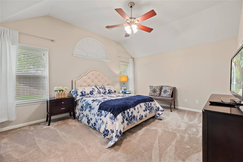 Another view of the primary bedroom.