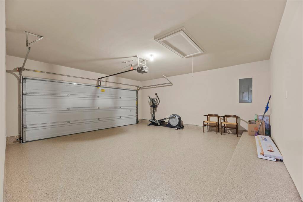 Spacious 2-car garage with beautiful Epoxy flooring.