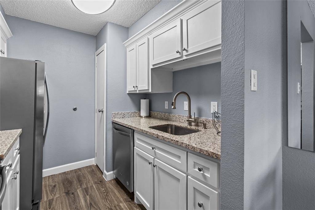 Update also includes a modern undermount sink with modern faucet and sprayer, and a pantry.