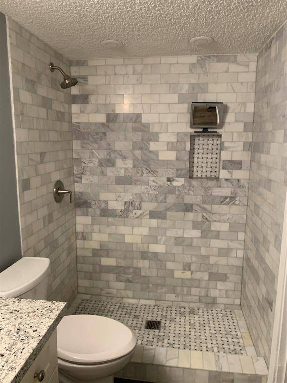 Remodeled walk-in shower.