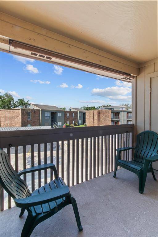 Private balcony with storage closet.