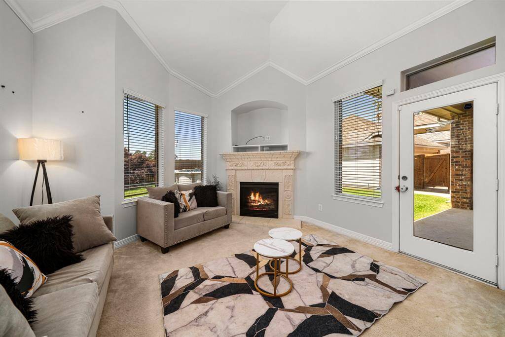 The cozy and luxurious extended Primary Bedroom Suite
