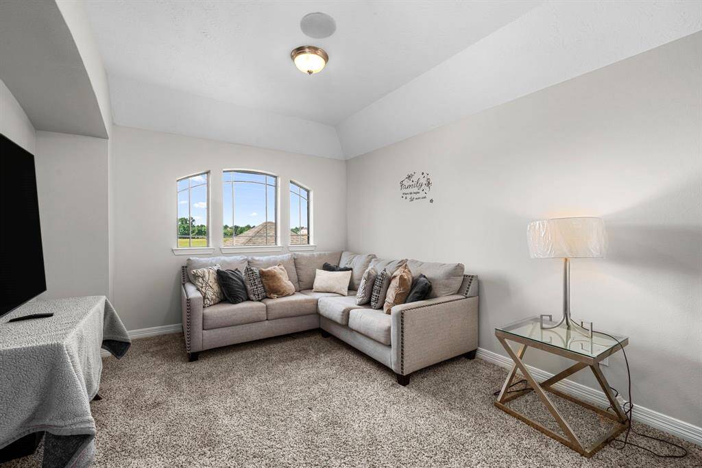 Conveniently located and well-lit spacious extended lounge/gaming area with wonderful window view