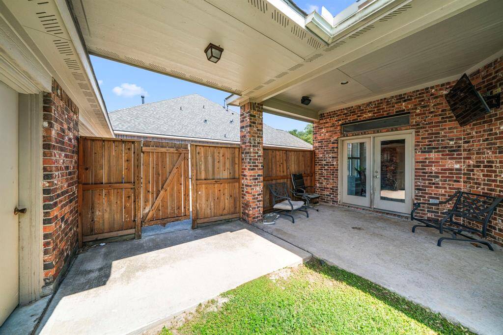 Comfortable covered patio and detached garage pathed connection