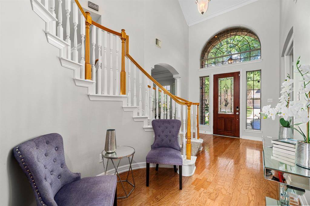 Welcoming Front Entrance with Semi winding Stairs