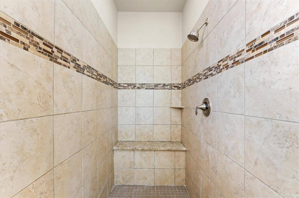 Primary bathroom shower.