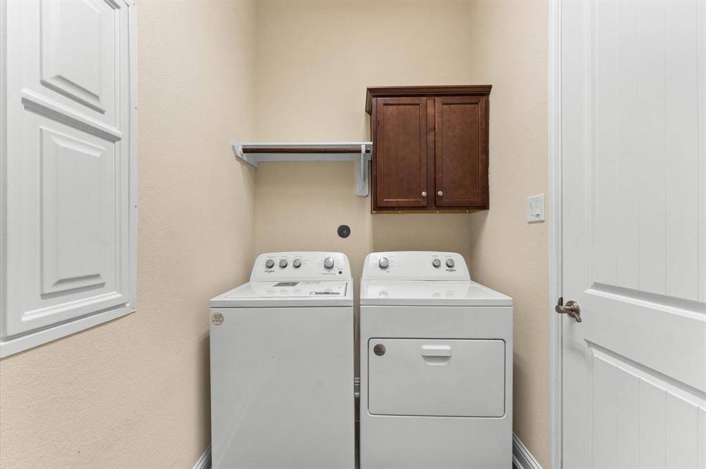Large washer and dryer room.