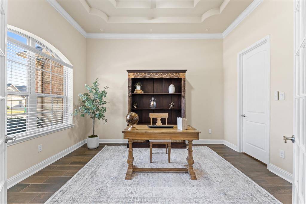 Large office right by the entrance with double French doors.