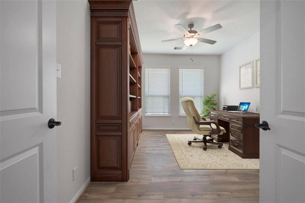 Work from home in this private study.Virtually Staged.