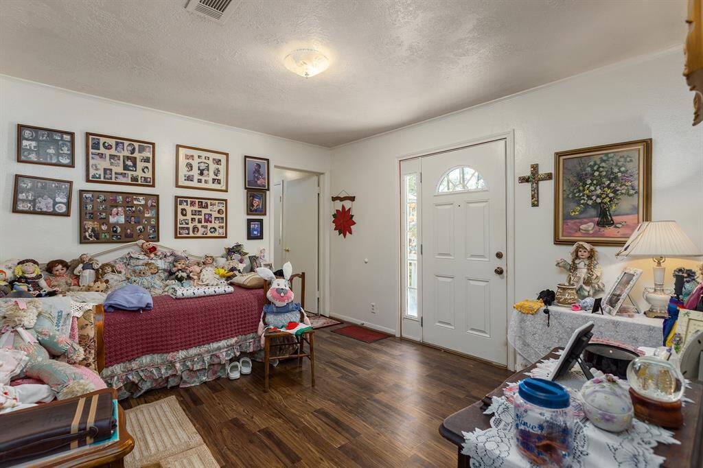 Side entry, this could be used as a sitting room, formal dining or other living space.