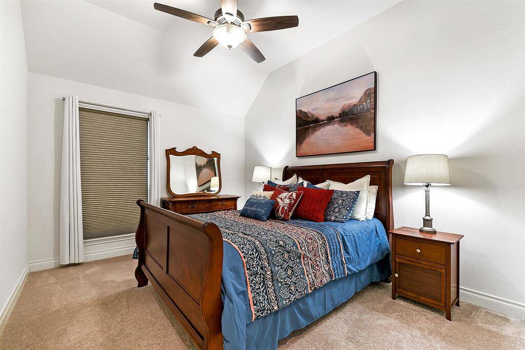 This single-story home features 4 spacious bedrooms, each offering plush carpet, great closet space, high ceilings, and ceiling fans.