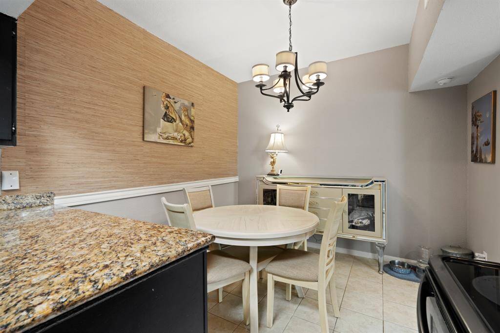 The open concept design seamlessly connects the kitchen to the dining area, creating an inviting and functional space. This layout allows for effortless movement between food preparation and dining, making meal times more convenient and enjoyable.