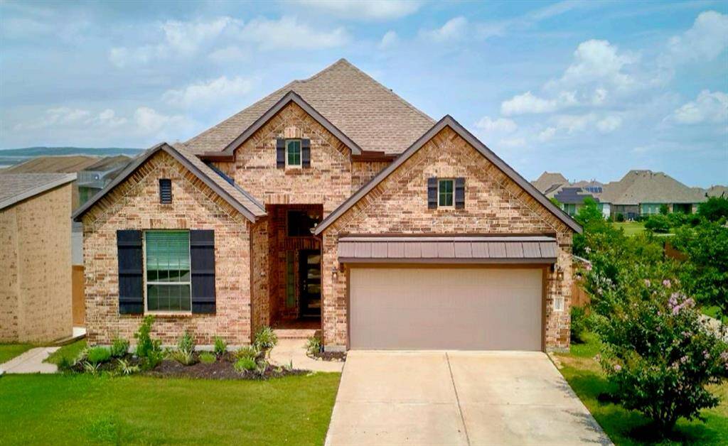 Discover your ideal one-story home with breathtaking lake views in the sought-after Elyson community. Enjoy a spacious covered front porch and beautiful professional landscaping.