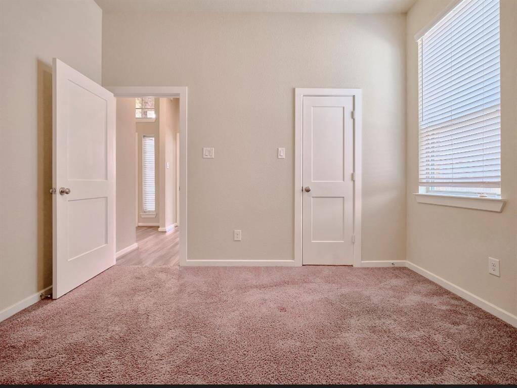 Inviting and roomy fourth bedroom.