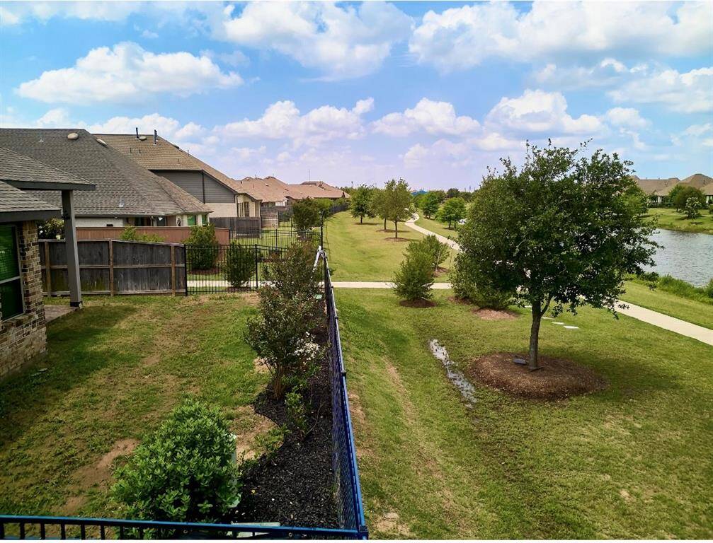 Enjoy serene privacy with this home, featuring a charming walkway and no immediate neighbors.