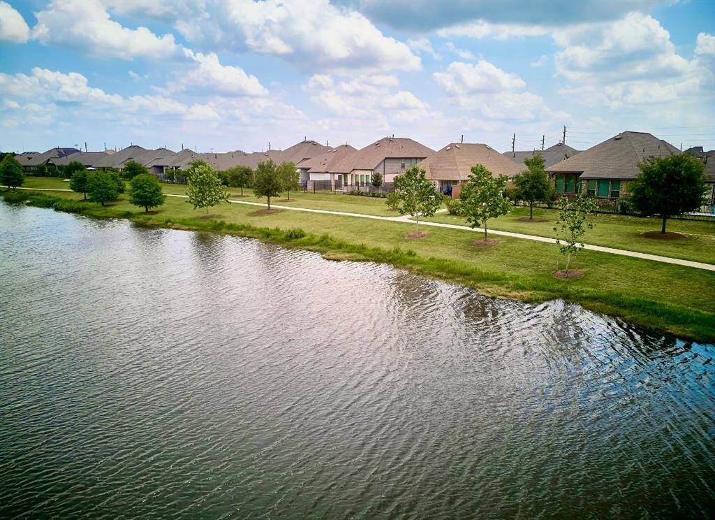 Serene backyard overlooking a tranquil lake.