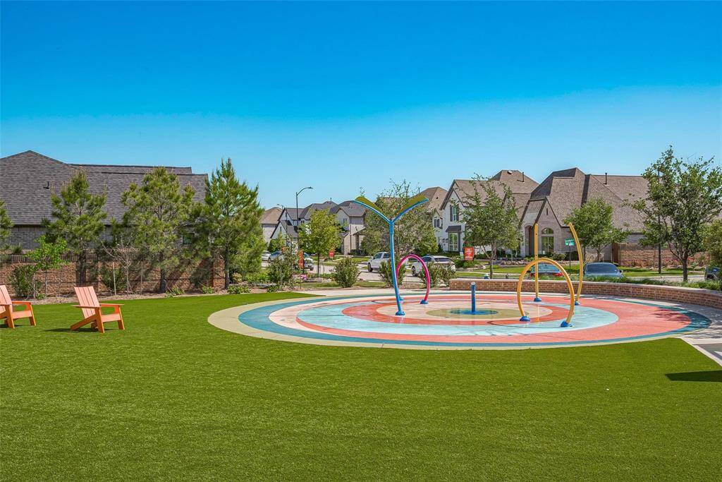 44 / 50Enjoy family fun with a vibrant splash pad, perfect for cooling off and entertaining kids in a friendly community setting.