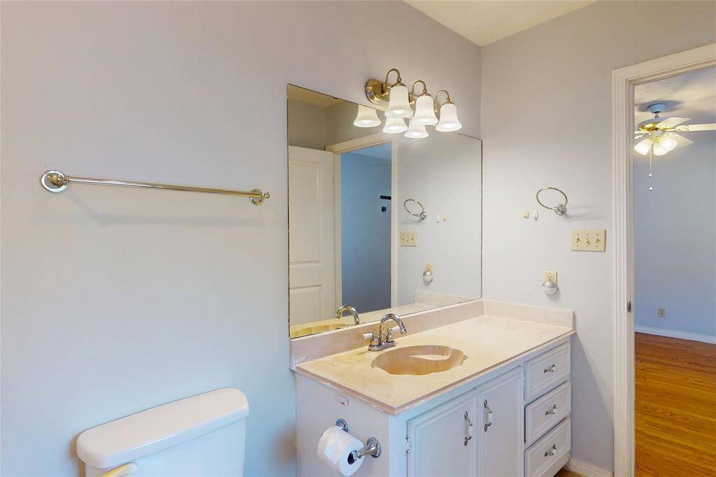 The second bathroom which is accessible through the hallway for guests as well.  Please note that this bathroom has a tub (not pictured).