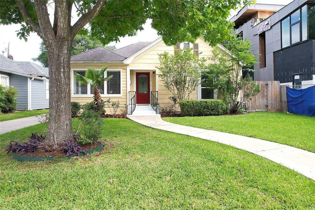 Well maintained home with a chance to live now and either remodel now (like the neighbor to the left of this picture) or build your dream home (like the neighbor to the right of this picture).