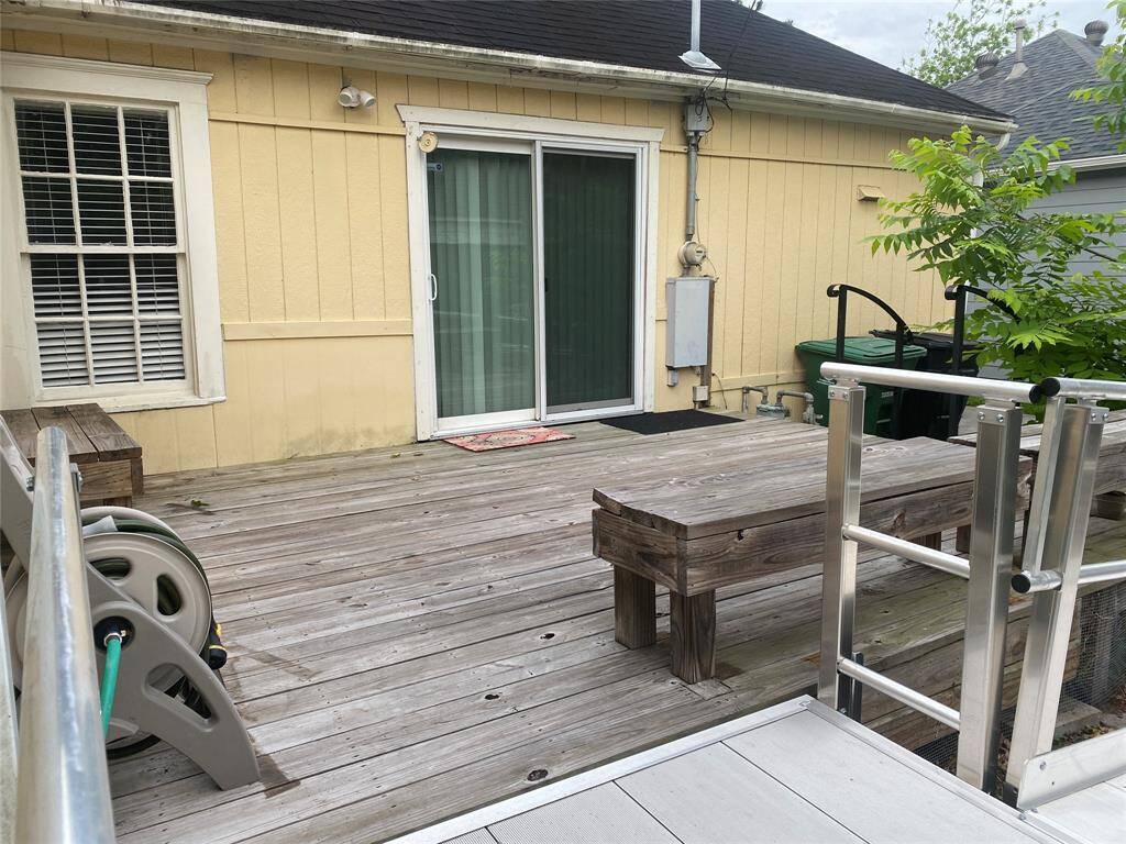 Backyard deck (16' by 12.5') with ramp access.