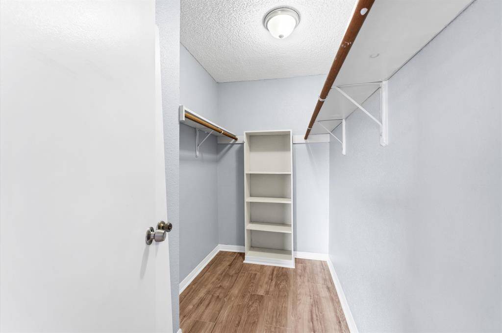 Another large walk-in closet in the secondary bedroom.